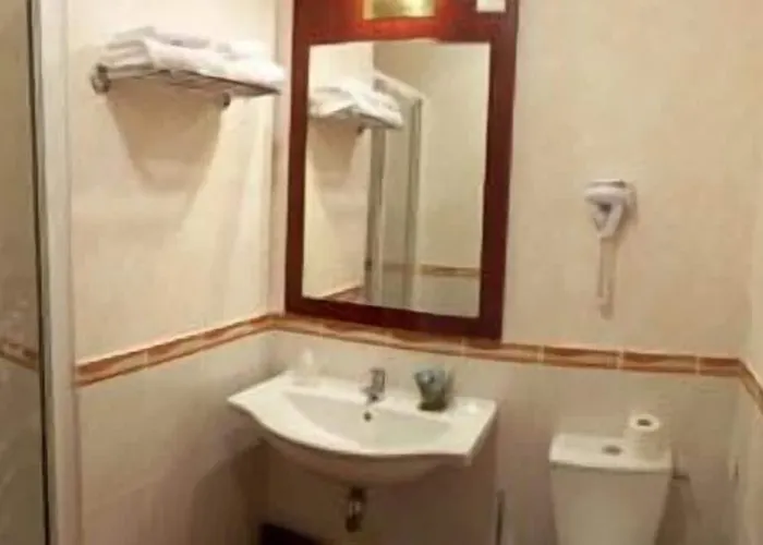 Au Feu De Bois Отель